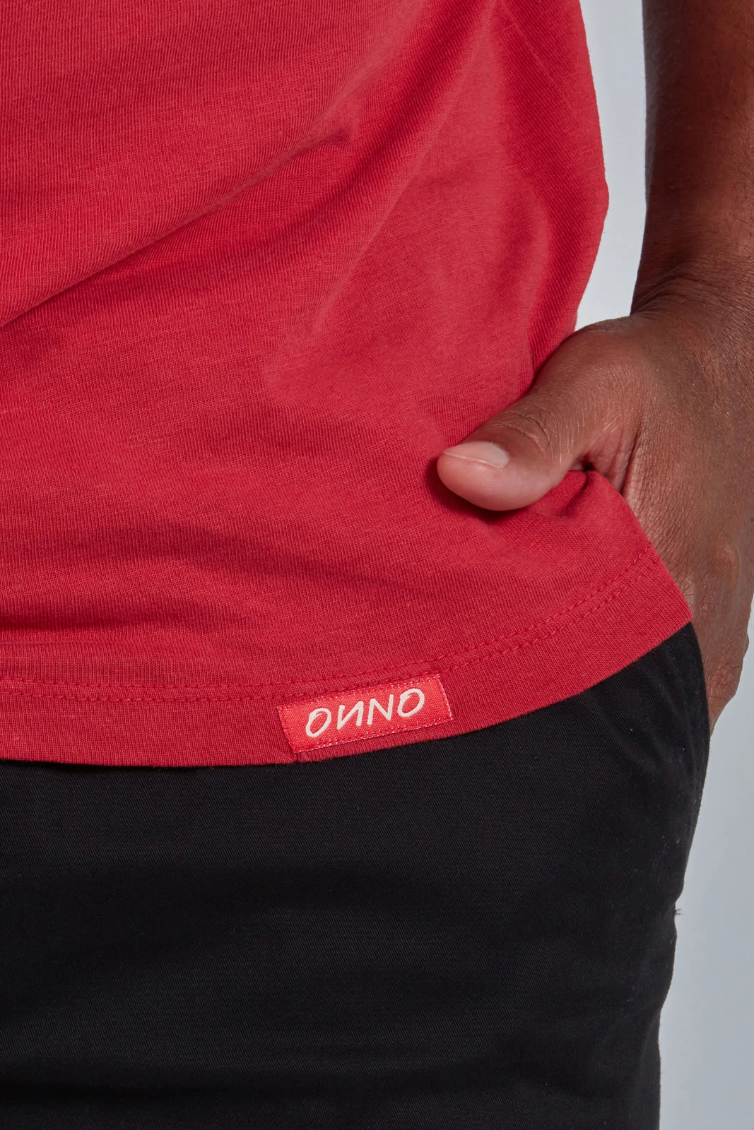 ONNO lyocell bamboo t-shirt in Earth Red, Golden is 6'0" and wearing size L.