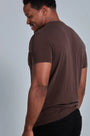 ONNO lyocell bamboo t-shirt in Espresso, Golden is 6'0" and wearing size L.