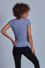 ONNO beechwood t-shirt in Stone, Sage is 5'7" and wearing size XS.