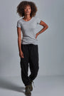 ONNO beechwood t-shirt in Heathered Granite, Sage is 5'7" and wearing size XS.