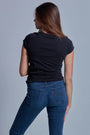 ONNO beechwood t-shirt in Black, Caroline is 5'8" and wearing size S.