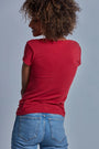 ONNO beechwood t-shirt in Earth Red, Sage is 5'7" and wearing size XS.