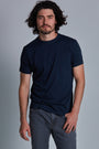 ONNO organic cotton t-shirt in Lapis Unpatched, Nic is 5'11" and wearing size M.