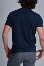 ONNO organic cotton t-shirt in Lapis Unpatched, Nic is 5'11" and wearing size M.