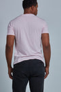 ONNO organic cotton t-shirt in Pink Unpatched, Golden is 6'0" and wearing size L.