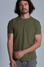 ONNO organic cotton t-shirt in Cypress Unpatched, Nic is 5'11" and wearing size M.