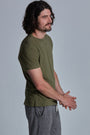 ONNO organic cotton t-shirt in Cypress Unpatched, Nic is 5'11" and wearing size M.