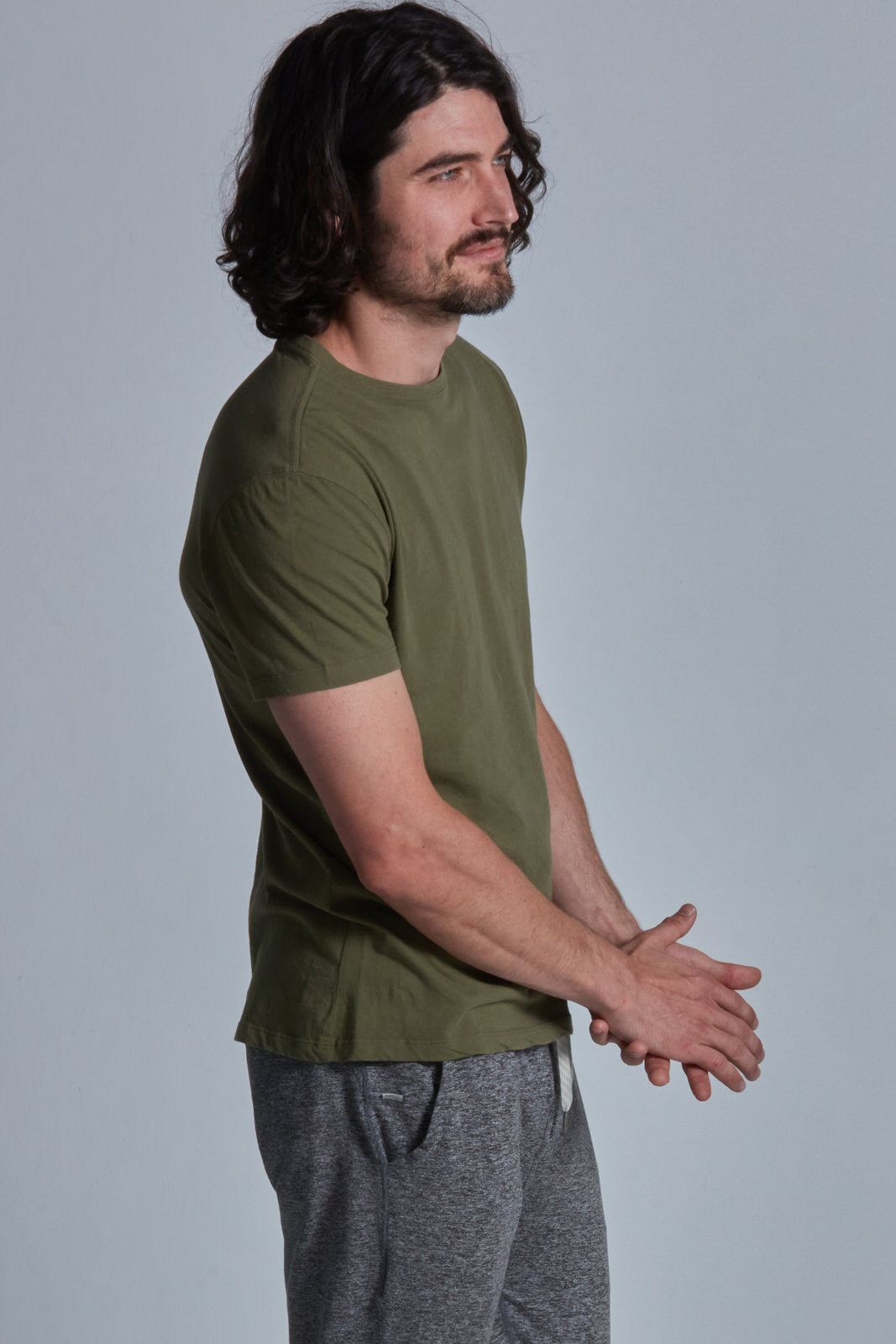 ONNO organic cotton t-shirt in Cypress Unpatched, Nic is 5'11" and wearing size M.