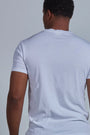 ONNO organic cotton t-shirt in White, Golden is 6'0" and wearing size L.
