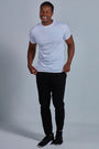 ONNO organic cotton t-shirt in White, Golden is 6'0" and wearing size L.