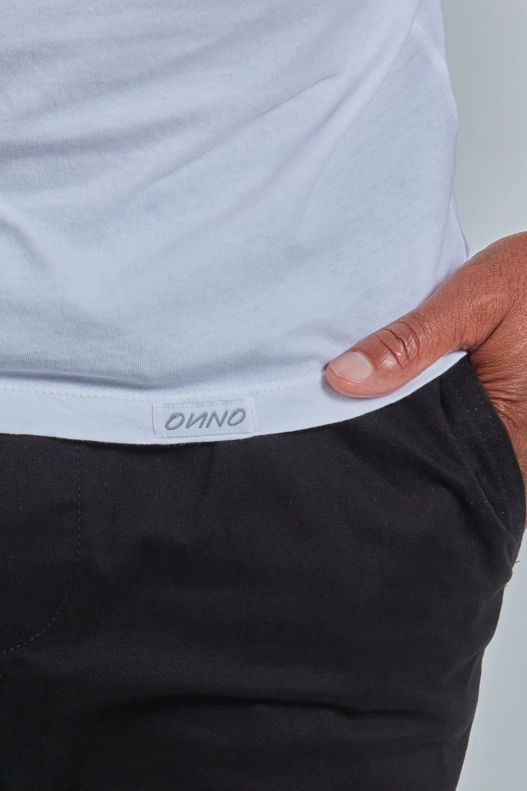 ONNO organic cotton t-shirt in White, Golden is 6'0" and wearing size L.