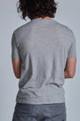 ONNO organic cotton t-shirt in Heathered Granite, Nic is 5'11" and wearing size M.