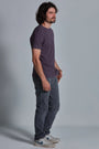 ONNO organic cotton t-shirt in Dirty Purple, Nic is 5'11" and wearing size M.