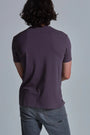ONNO organic cotton t-shirt in Dirty Purple, Nic is 5'11" and wearing size M.
