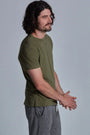 ONNO organic cotton t-shirt in Cypress, Nic is 5'11" and wearing size M.