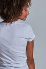 ONNO organic cotton t-shirt in White, Sage is 5'7" and wearing size XS.
