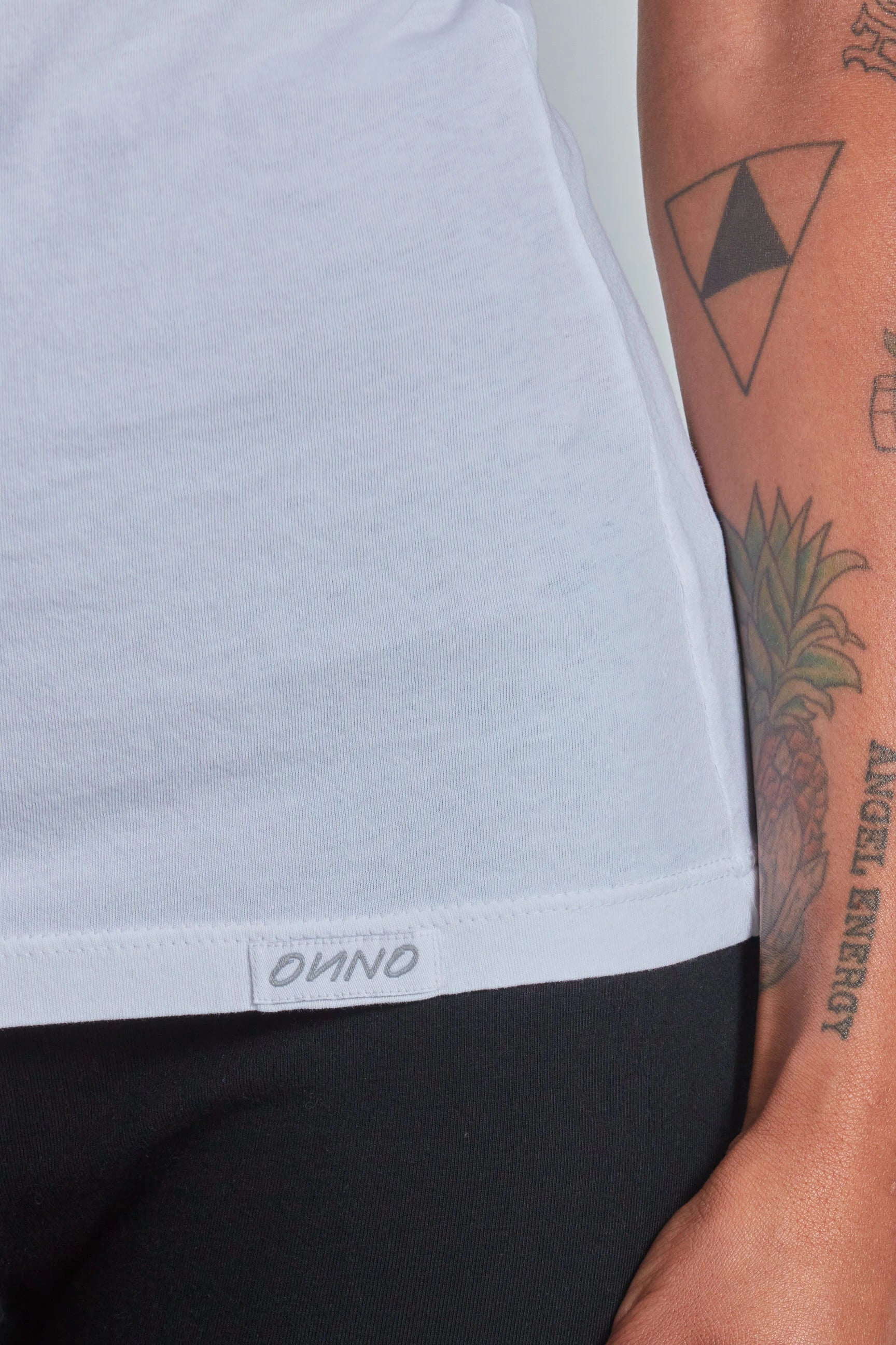 ONNO organic cotton t-shirt in White, Sage is 5'7" and wearing size XS.