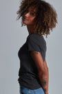 ONNO organic cotton t-shirt in Heathered Basalt, Sage is 5'7" and wearing size XS.