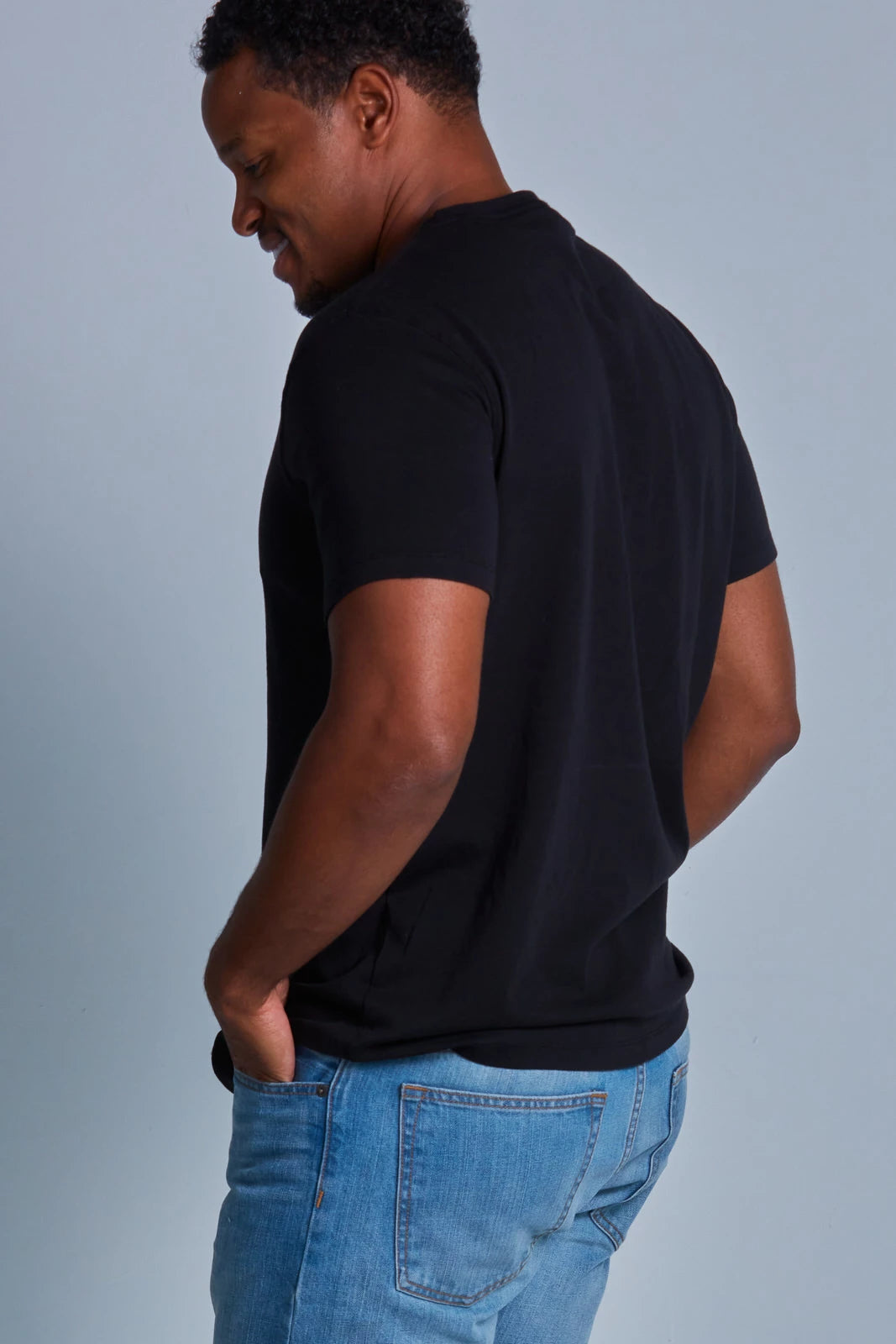 ONNO pima cotton t-shirt in Black, Golden is 6'0" and wearing size L.