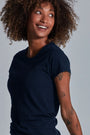 ONNO pima cotton t-shirt in Lapis, Sage is 5'7" and wearing size XS.